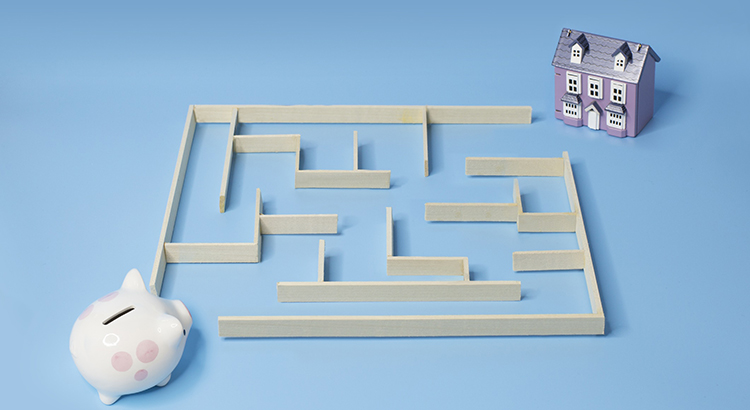A maze with a home at one end signifying the 2008 housing crisis.