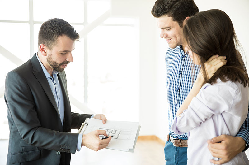 agent showing floor plan